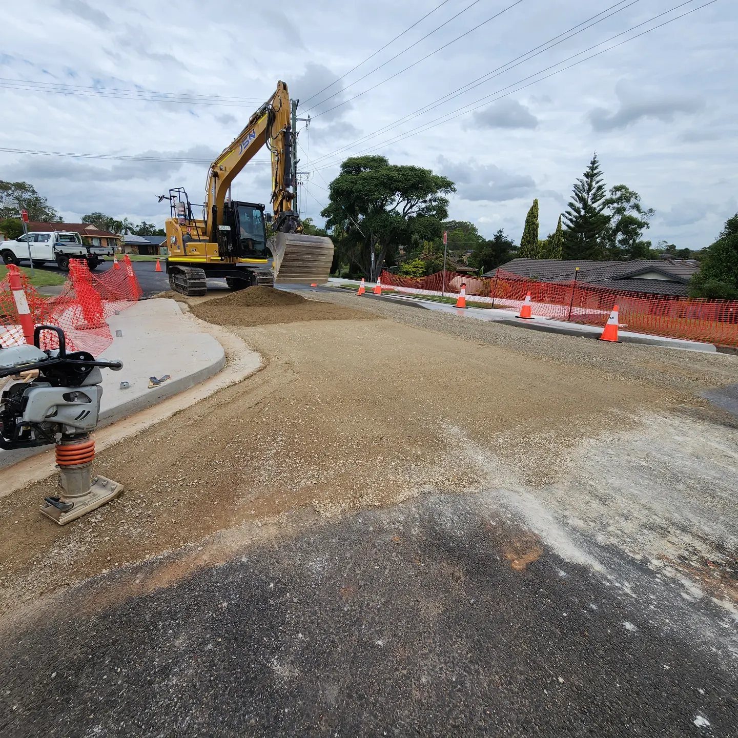 Excavator and compactor on a roadworks project